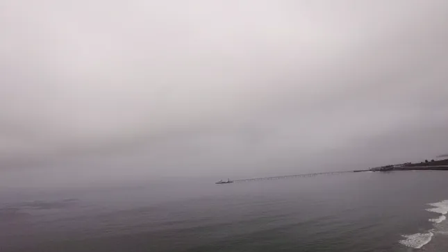 DJ Micro drone fly by on the beach