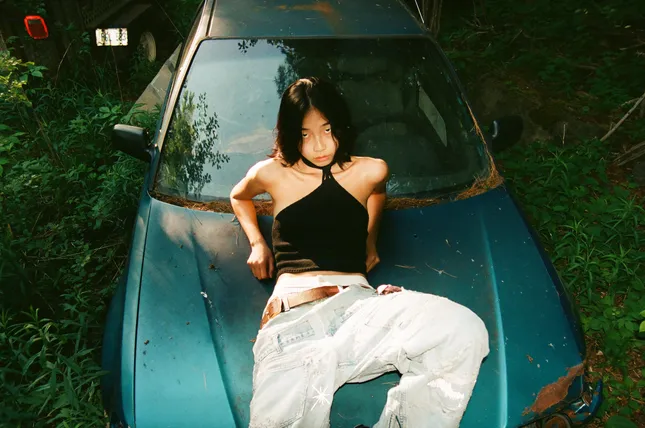 anne in a junkyard