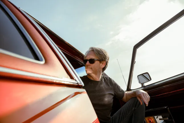 Larson Owston and his Cadillac DeVille 1978