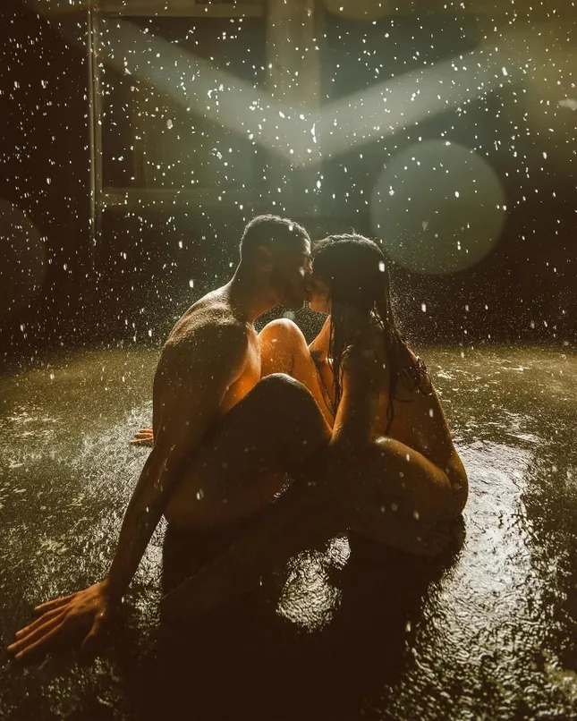 Couple in rain room